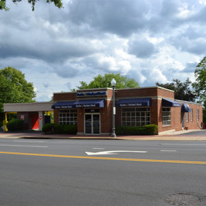 Burke &amp; Herbert Bank West Broad Street branch in Falls Church, VA, offering both lobby and drive-up banking services.