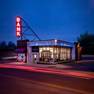 Exterior view of Burke &amp; Herbert Bank Monroe Avenue branch in Alexandria, VA, providing drive-up and walk-in banking services.