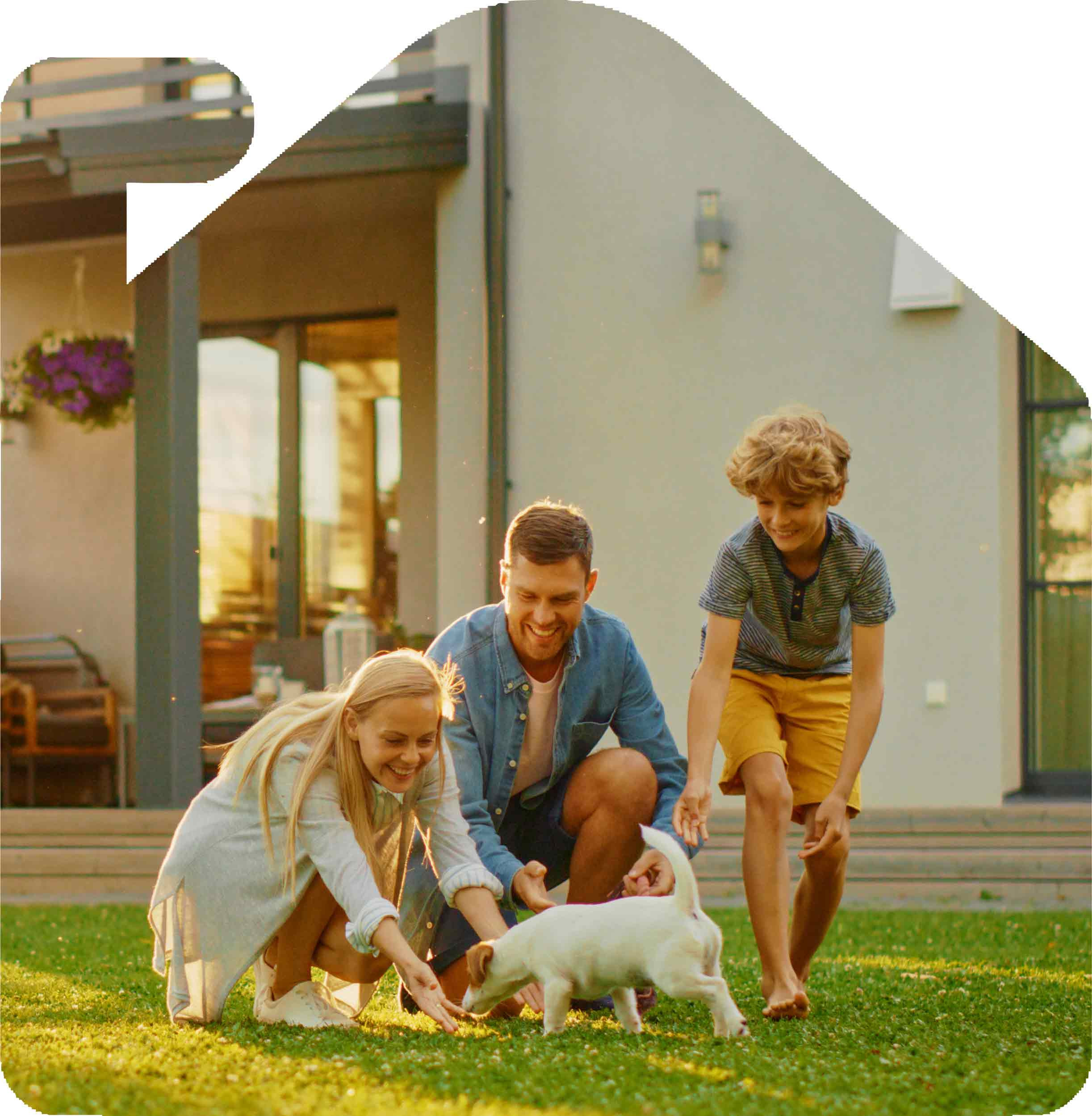 Exterior of a beautiful suburban home with a lush green lawn and a swing set, representing the dream of homeownership.