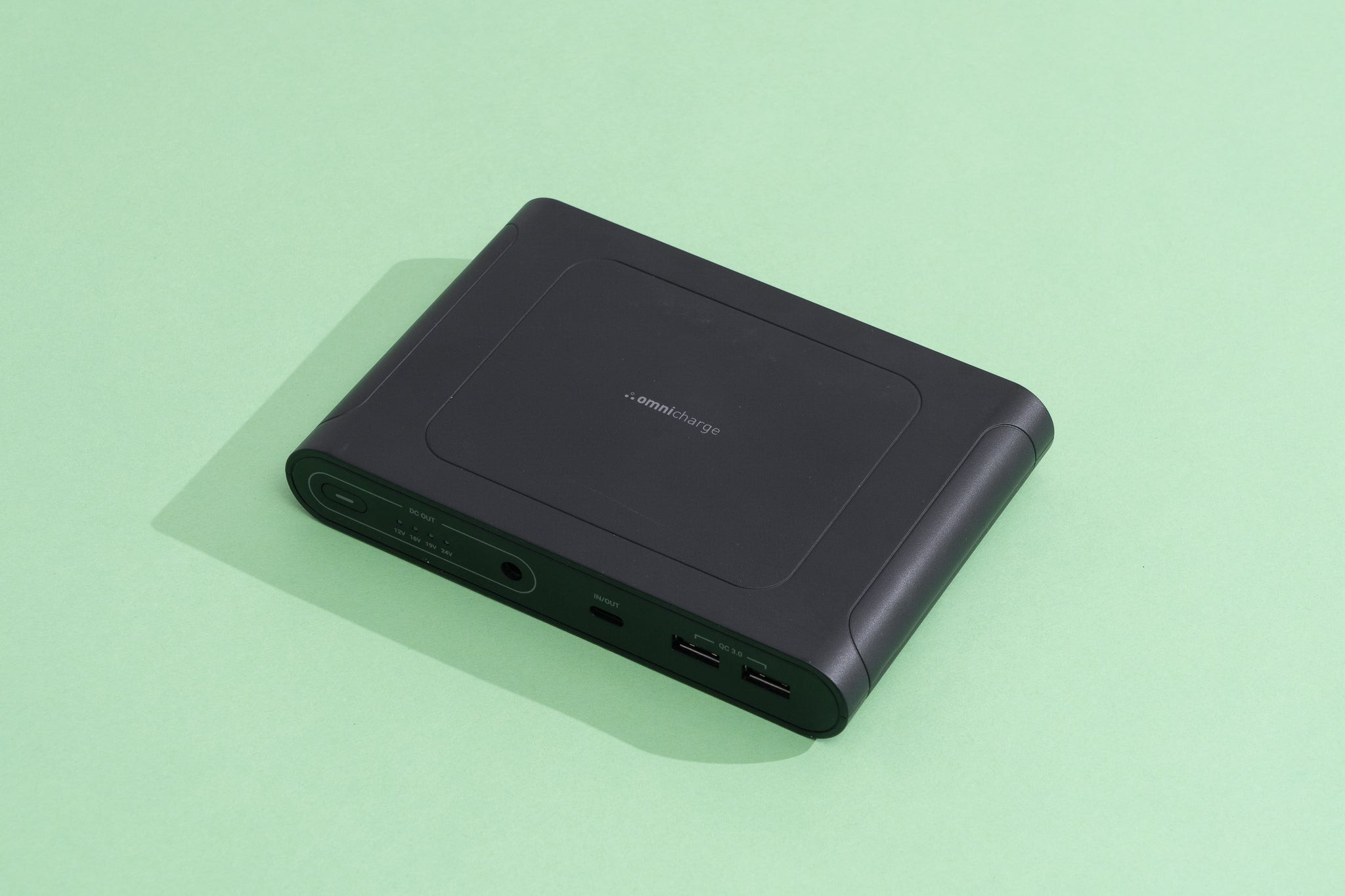 Omnicharge Omni Mobile 25600 portable laptop charger power bank showcasing its sleek design and multiple ports.