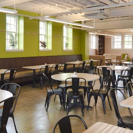 A welcoming kitchen interior, suggesting a community meal setting at Roots.