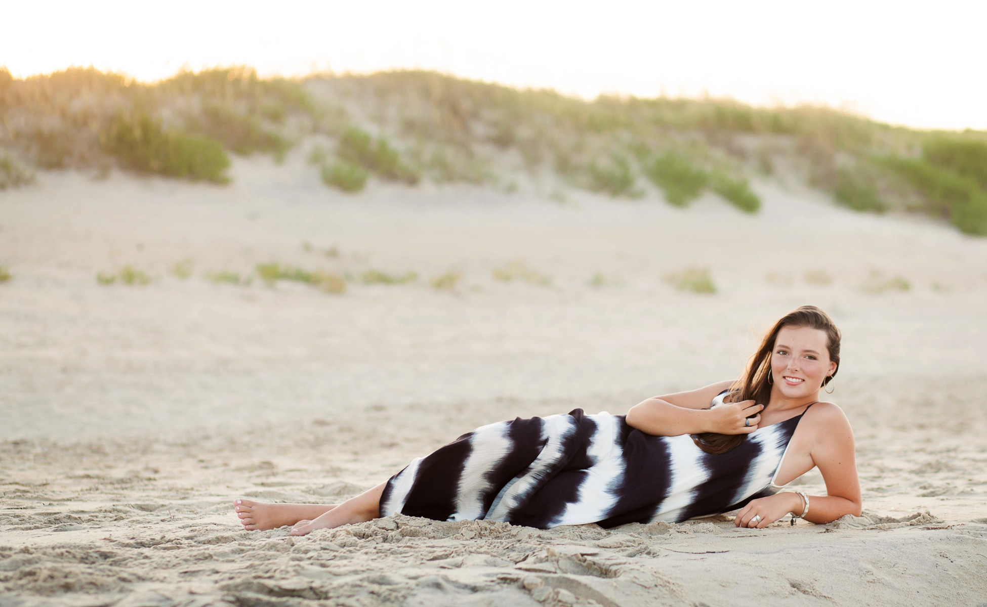 Outdoor senior portraits Outer Banks, Emily in a natural and vibrant setting