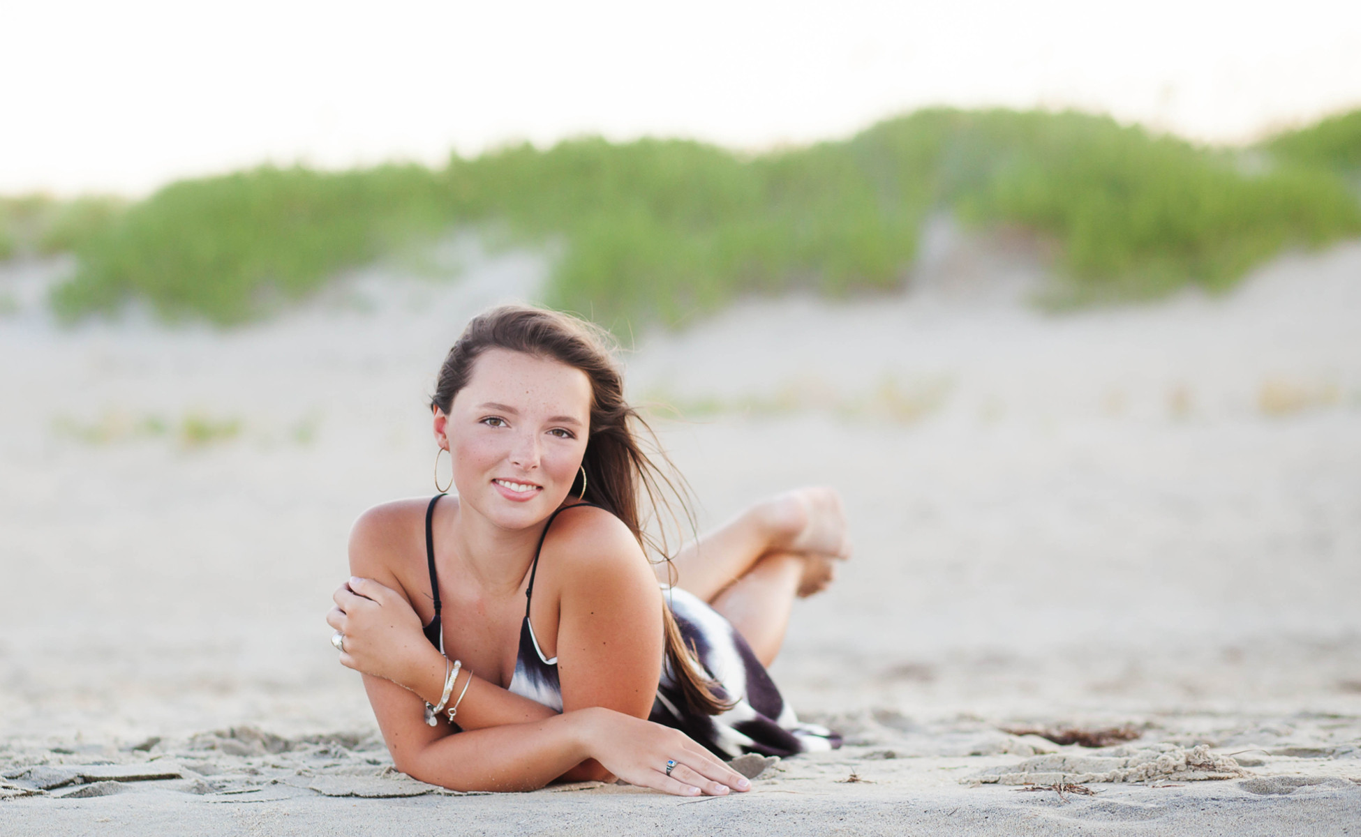 Candid moment senior portrait, Outer Banks, Emily's genuine smile captured