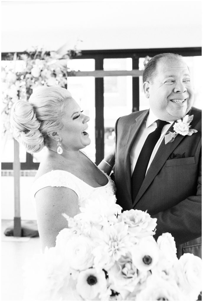 Flower girl looking adorable at the wedding ceremony at Teak Red Bank.