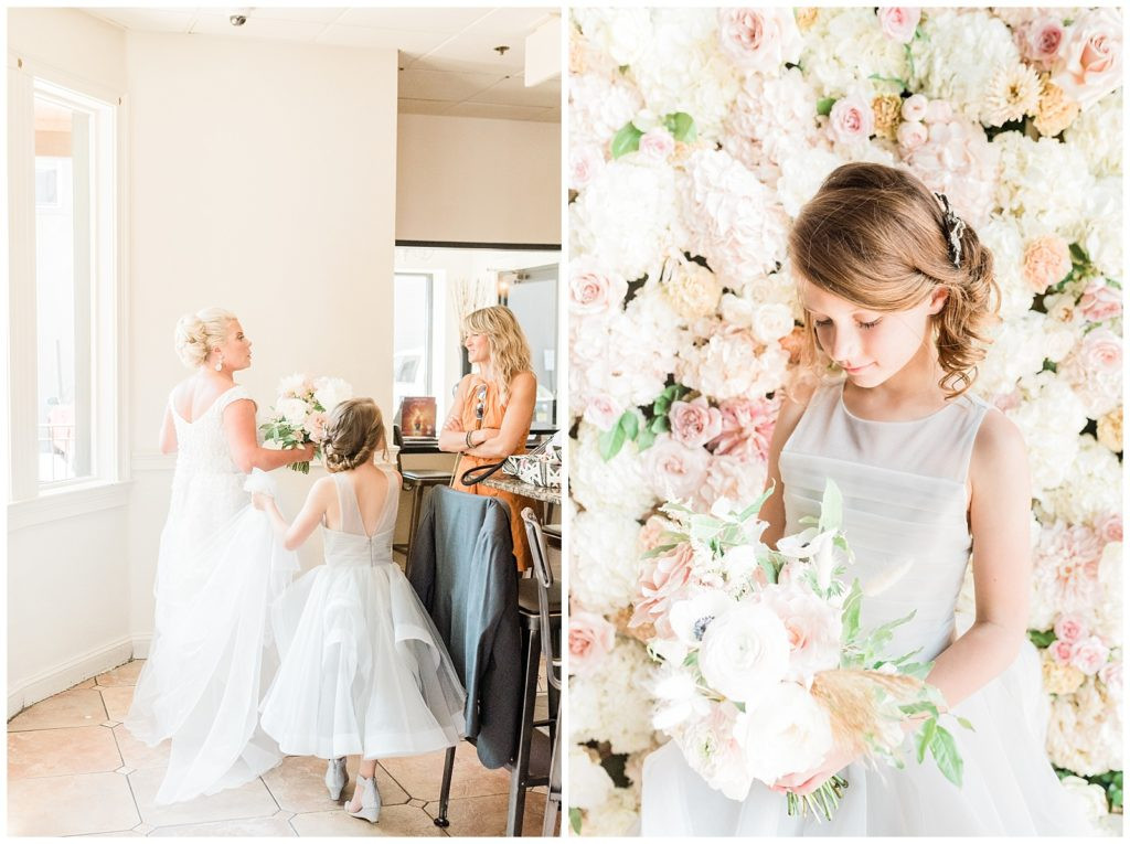 Flower girl carrying the bride's dress at Teak Red Bank wedding.