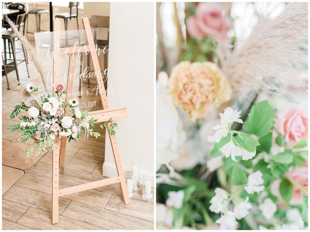 Elegant welcome sign with white calligraphy at Teak Red Bank wedding.