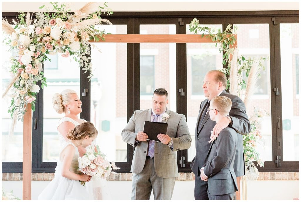 Officiant leading the wedding ceremony at Teak Red Bank, NJ.