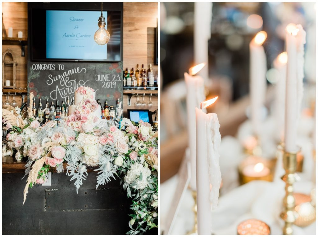 Flowers cascading around the wedding cake at Teak Rooftop reception in Red Bank.