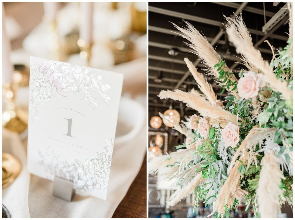 Elegant centerpiece cards on fabric runner at Teak Red Bank wedding reception.