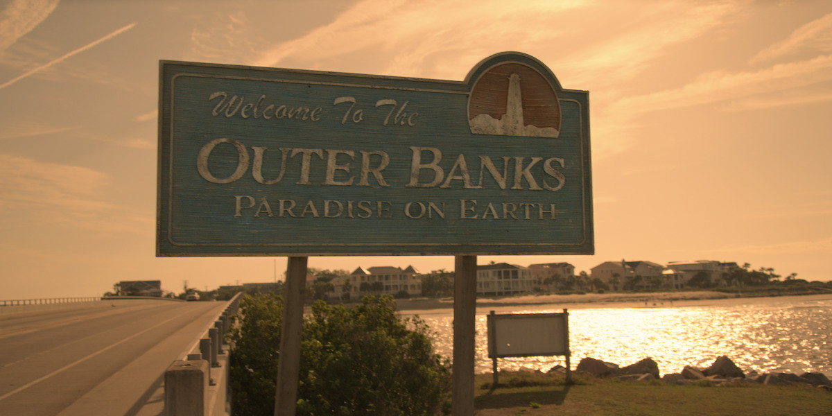 The scenic Shem Creek in Mount Pleasant, South Carolina, known for its shrimp boats and seafood restaurants, providing a perfect backdrop for waterfront scenes.