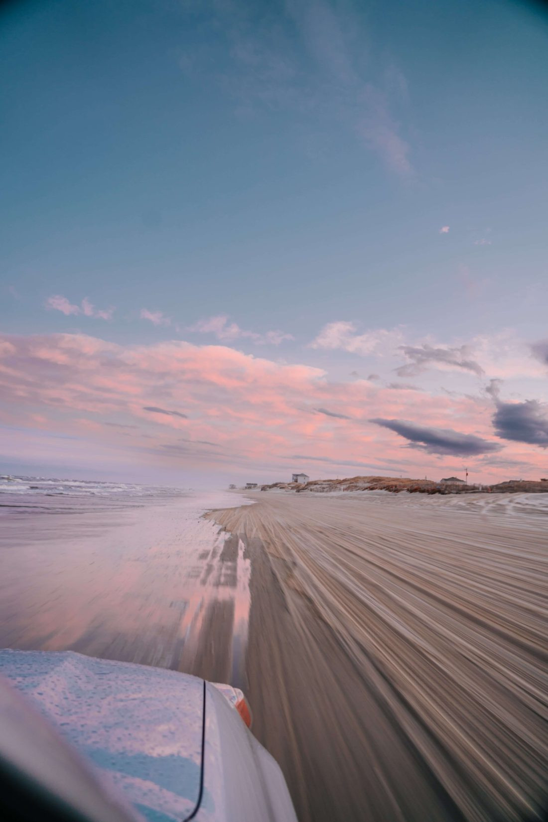 SUV driving on Outer Banks 4x4 beach